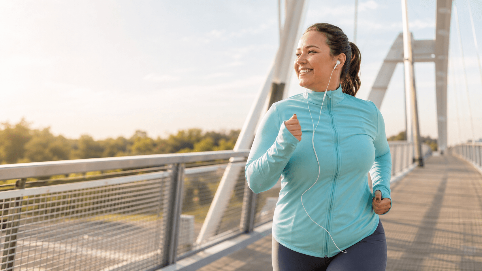 Editorial image of a woman running outdoors for medical weight management